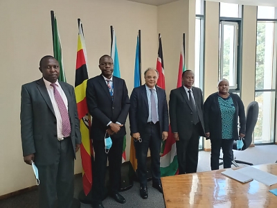Chairperson of the EAC Coordinating Committee, Dr. Kevit Desai (c) visits the EAC Competition Authority during a working visit to the EAC Headquarters in Arusha, Tanzania.